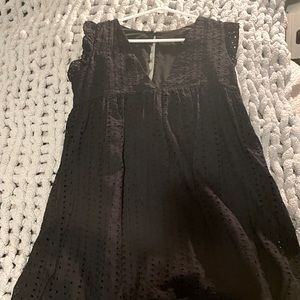 Eyelet black dress with pockets and built in shorts